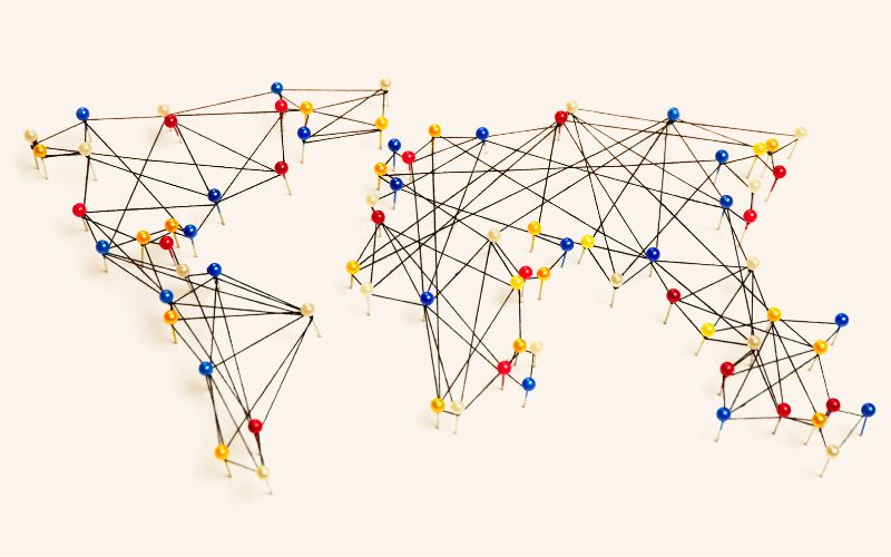 A map of the world created using string and push pins