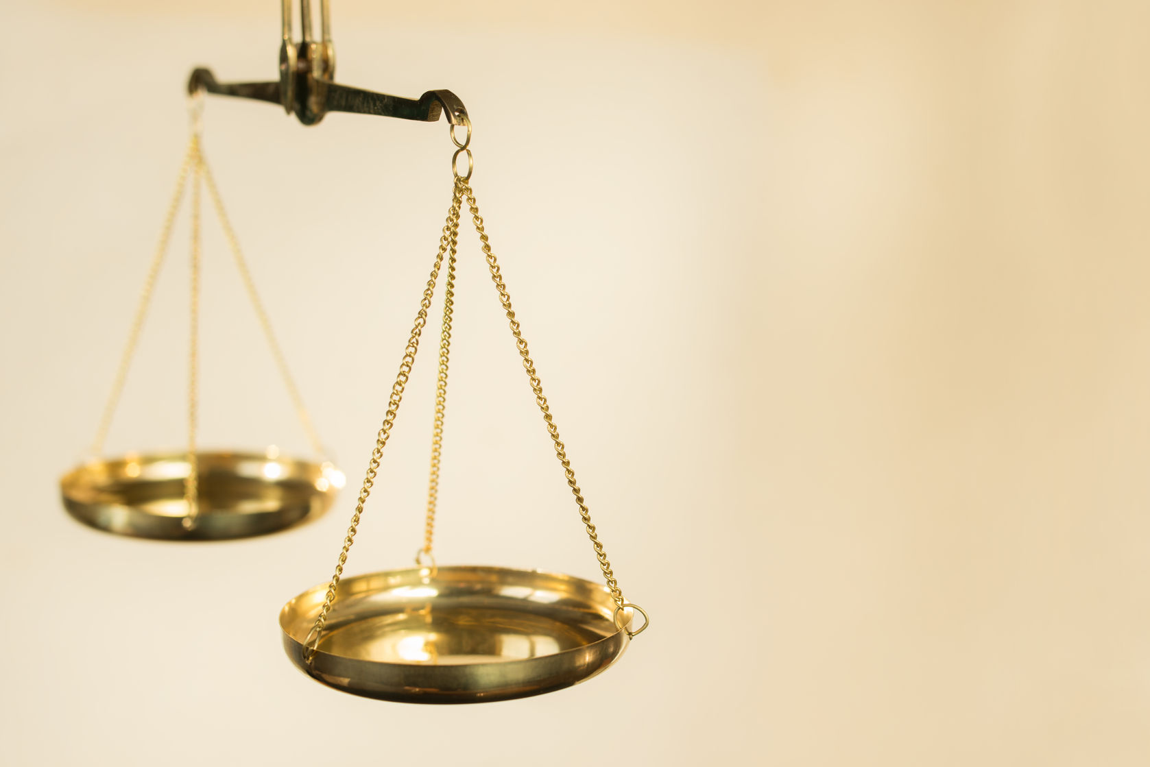 A pair of old fashioned brass weighing scales
